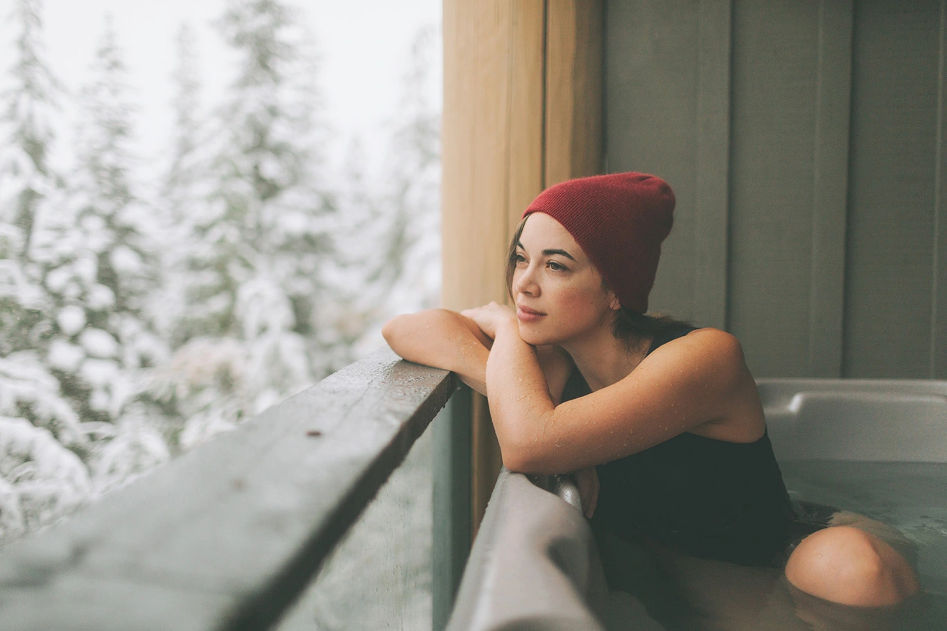 Woman in hot tub in winter